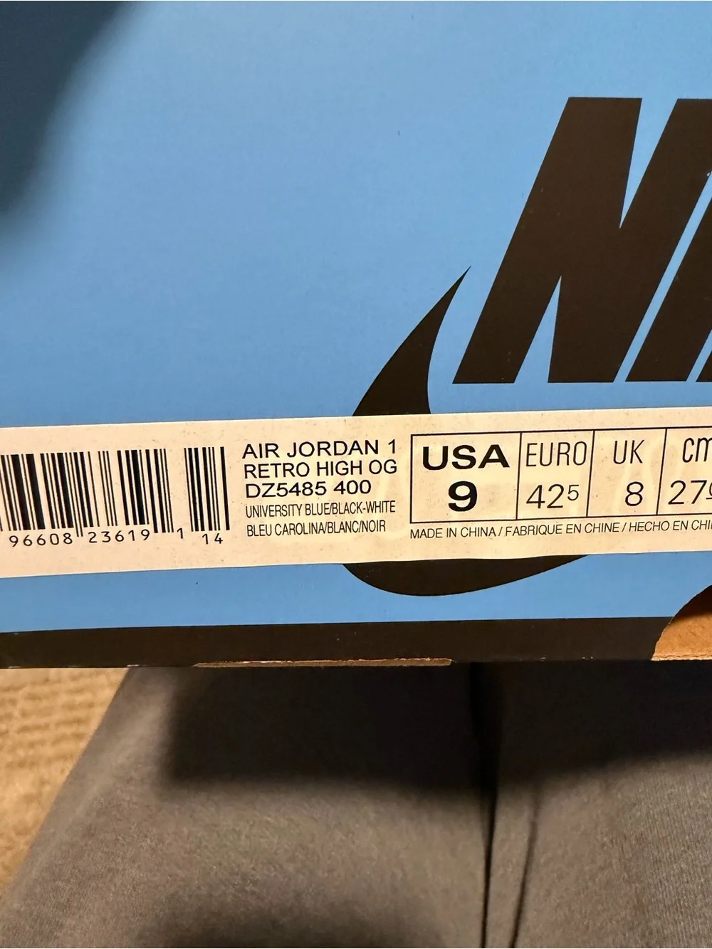 Jordan Retro High Top in Black/White/Light Blue